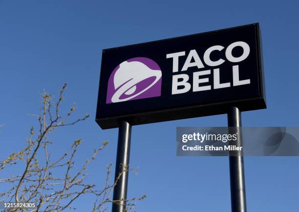 An exterior view shows a sign at a Taco Bell restaurant on March 30, 2020 in Las Vegas, Nevada. Taco Bell Corp. Announced that on March 31 the...