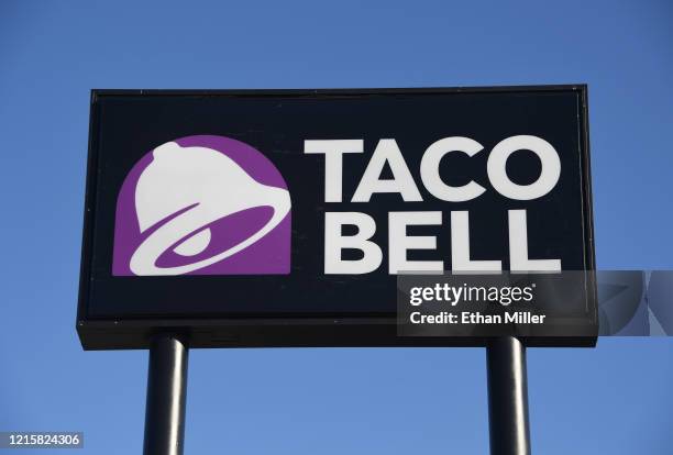 An exterior view shows a sign at a Taco Bell restaurant on March 30, 2020 in Las Vegas, Nevada. Taco Bell Corp. Announced that on March 31 the...