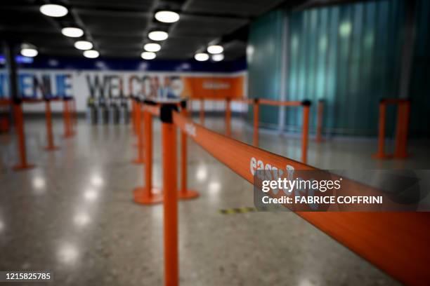 The empty check-in area of British no-frills airline EasyJet is seen during a press conference on May 28, 2020 on reopening plans of Geneva Airport...