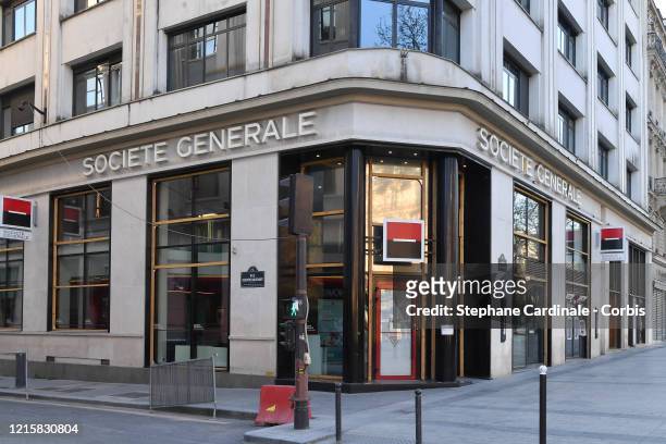 View of closed Societe Generale bank on the Champs Elysees during the Coronavirus epidemic on March 30, 2020 in Paris, France. The country is fining...