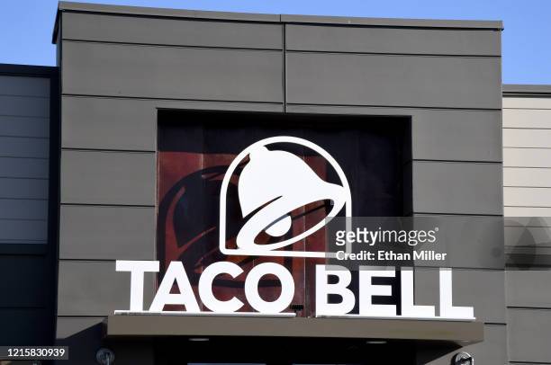 An exterior view shows a sign at a Taco Bell restaurant on March 30, 2020 in Las Vegas, Nevada. Taco Bell Corp. Announced that on March 31 the...