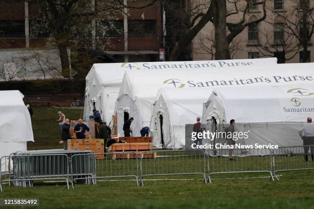 Temporary field hospital for the treatment of coronavirus patients is set up at Central Park on March 30, 2020 in New York City. The field hospital...