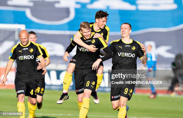 Randers FC's Simon Piesinger celebrates scoring the opening goal with his teammates during the 3F Super League football match between AGF and Randers...