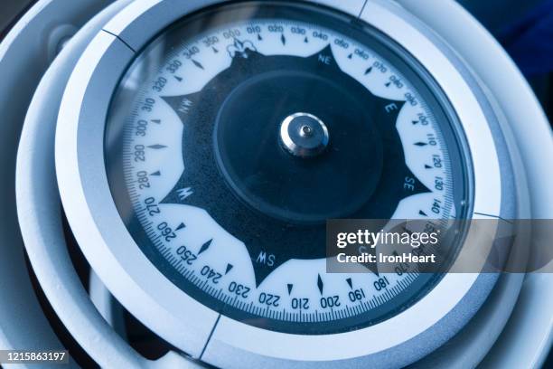 marine compass. - nautical compass stock pictures, royalty-free photos & images