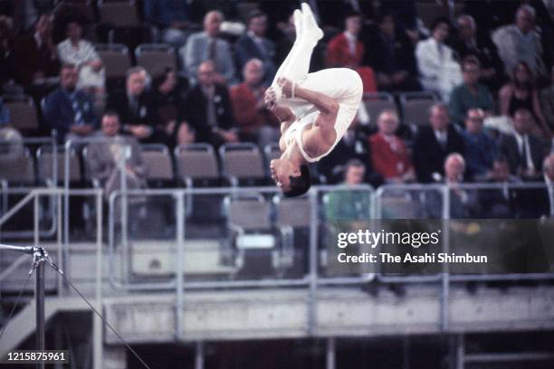 Sawao Kato of Japan competes in the Horizontal Bar of the Artistic Gymnastics Men's Team during the Munich Olympic Games at the Sporthalle on August...
