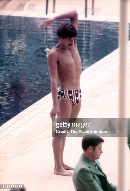Mark Spitz of the United States warms up prior to competing in the Swimming Men's 200m Butterfly final during the Munich Olympic Games at the...