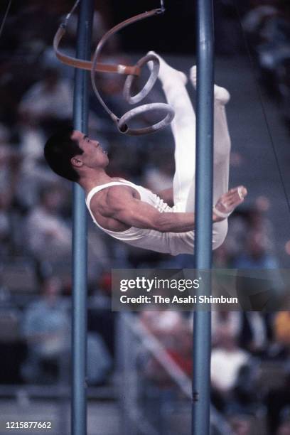 Sawao Kato of Japan competes in the Parallel Bars of the Artistic Gymnastics Men's Individual All-Around during the Munich Olympic Games at the...