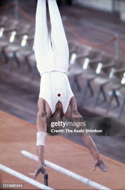 Sawao Kato of Japan competes in the Uneven Bars of the Artistic Gymnastics Men's Apparatus final during the Munich Olympic Games at the Sporthalle on...