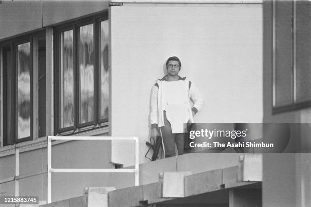 An armed police officer holding a rifle stands at the rooftop of the building as terrorist group 'Black September' take hostages at the residence of...