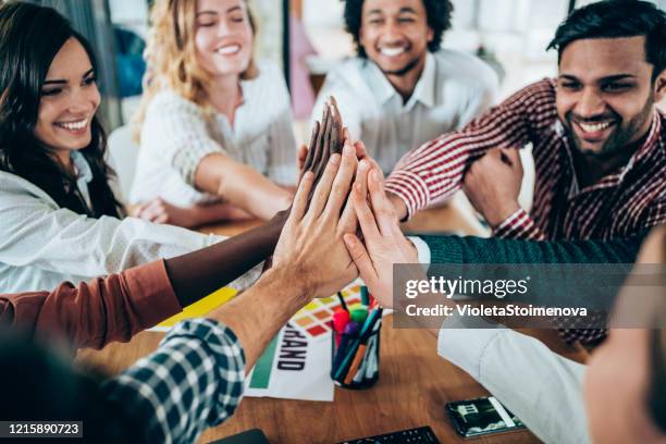 motivating the team - group of beautiful people stock pictures, royalty-free photos & images