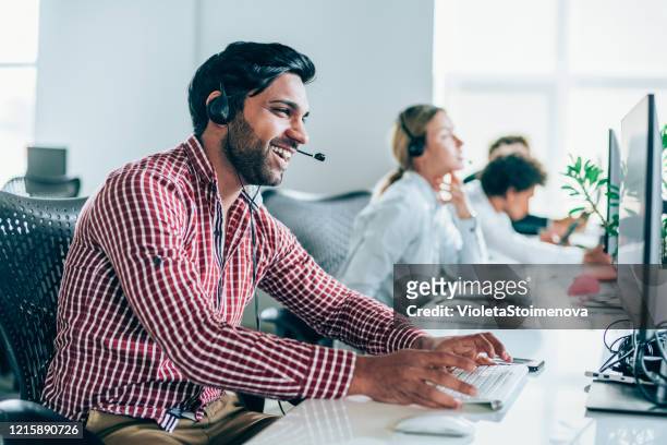 answering your call with a smile - happy customer stock pictures, royalty-free photos & images