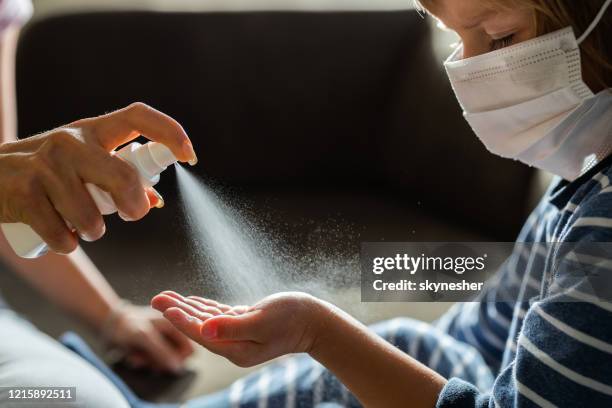 hand disinfection is the most important thing during corona virus! - social distancing kids stock pictures, royalty-free photos & images