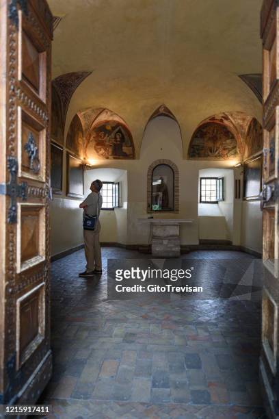 cascia -  monastery of santa rita -painting in the gallery of the monastery - cascia stock pictures, royalty-free photos & images