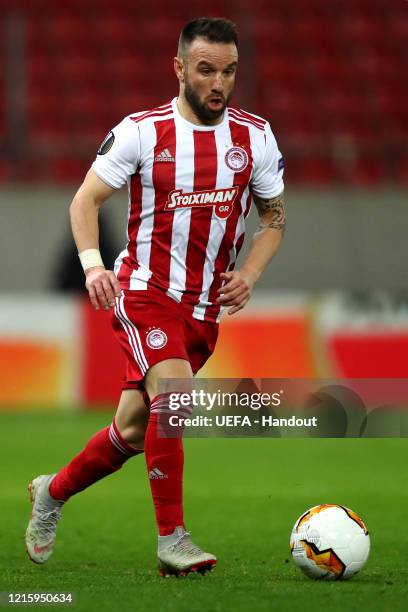 In this handout image provided by UEFA, Mathieu Valbuena of Olympiacos in action during the UEFA Europa League round of 16 first leg match between...