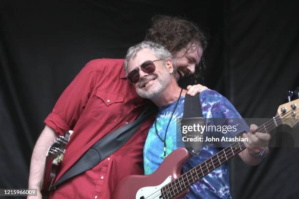 Father and son, Patterson and David Hood are shown on stage at Mountain Jam in Hunter, New York during a Drive By Truckers concert performance on...