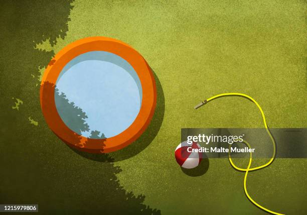 wading pool, beach ball and hose in sunny backyard - childrens pool stock illustrations