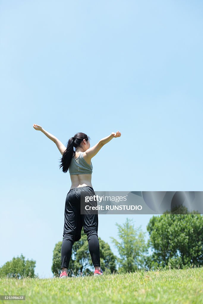 Young woman outdoor exercise,stretch