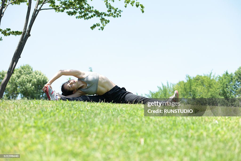 Young woman outdoor exercise,stretch