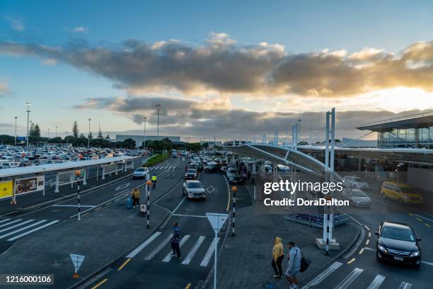 auckland airport terminal at dawn, new zealand - auckland transport stock pictures, royalty-free photos & images