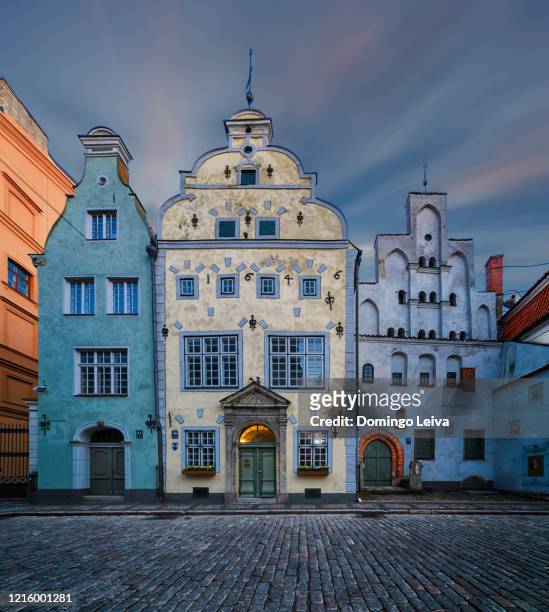 residence of the three brothers, riga, latvia - riga stock pictures, royalty-free photos & images