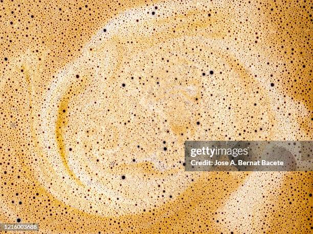 full frame of a cup of freshly made coffee with milk, backgrounds. - coffee foam imagens e fotografias de stock