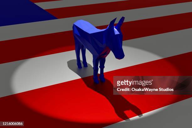 democratic blue donkey in spotlight on top of american flag - democratic party usa bildbanksfoton och bilder