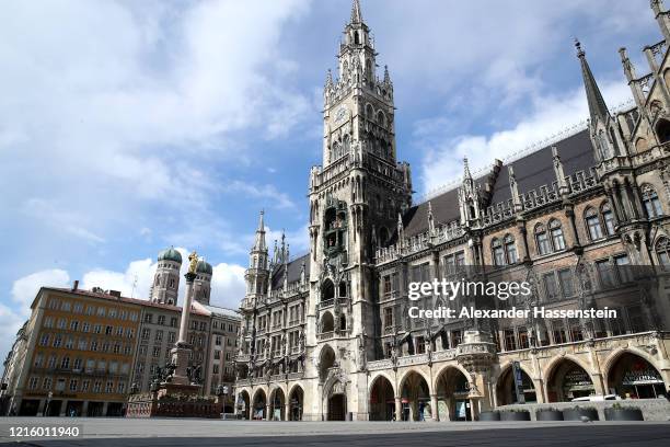 The empty Marienplatz with the Townhall of Munich is seen during the coronavirus crisis on March 31, 2020 in Munich, Germany. Public life in Germany...