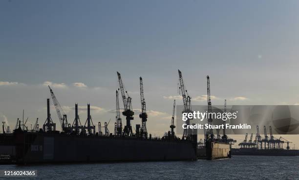 The docks of Blohm and voss stand empty during the coronavirus pandemic on March 31, 2020 in Hamburg, Germany. Public life in Germany has been...