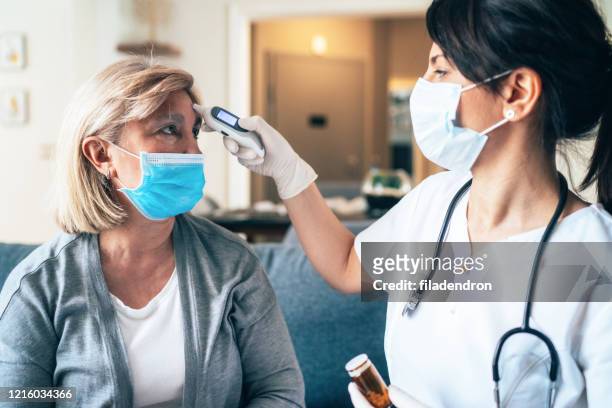 coronavirus protection during the quarantine - symptom stock pictures, royalty-free photos & images