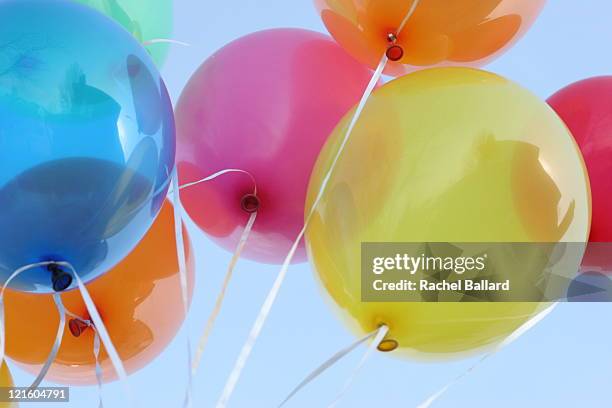 colourful balloons - balloon sky stock pictures, royalty-free photos & images