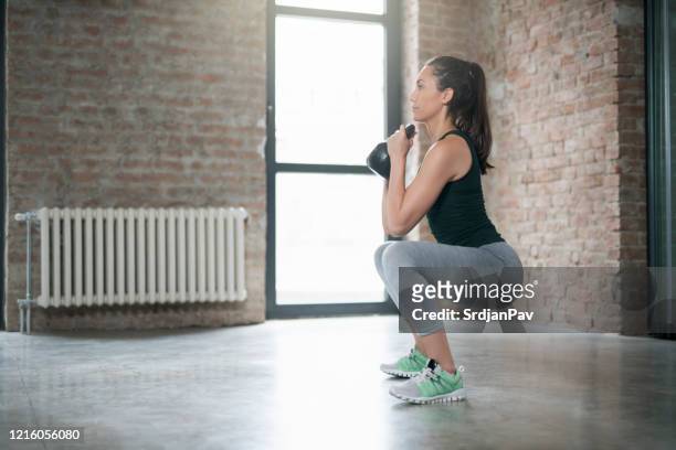 gym leg burn - squat stock pictures, royalty-free photos & images