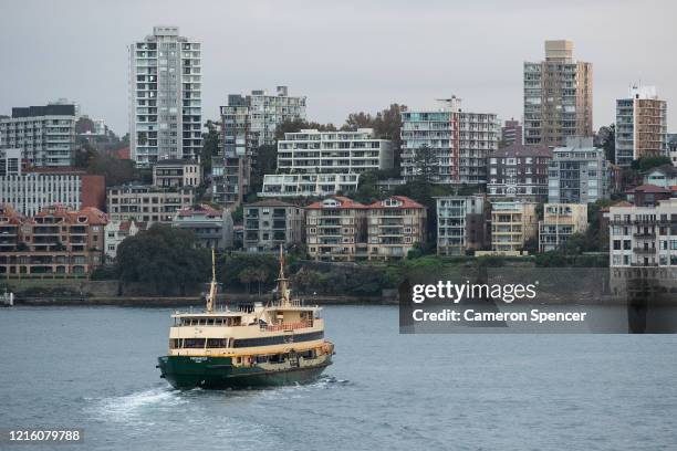 The 'Freshwater' ferry heads through Sydney Harbour bound for Manly on April 01, 2020 in Sydney, Australia. The state of New South Wales in Australia...