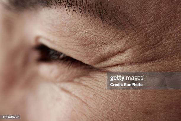 midleage woman,skin close-up - wrinkled stockfoto's en -beelden