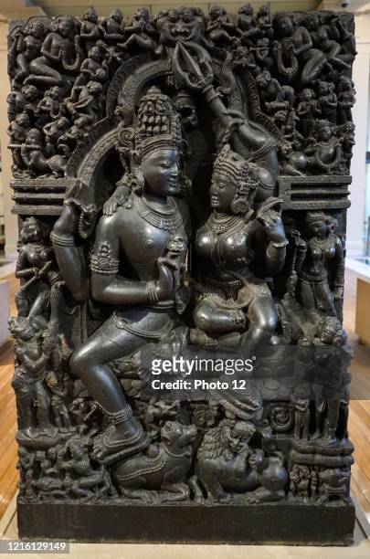 Detail of a bronze statue depicting the deity Shiva and the Goddess Parvati sitting as the primordial divine couple. Dated 12th Century.