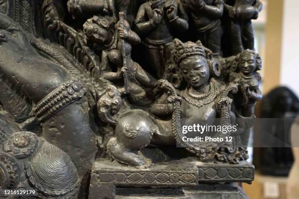 Detail of a bronze statue depicting the deity Shiva and the Goddess Parvati sitting as the primordial divine couple. Dated 12th Century.