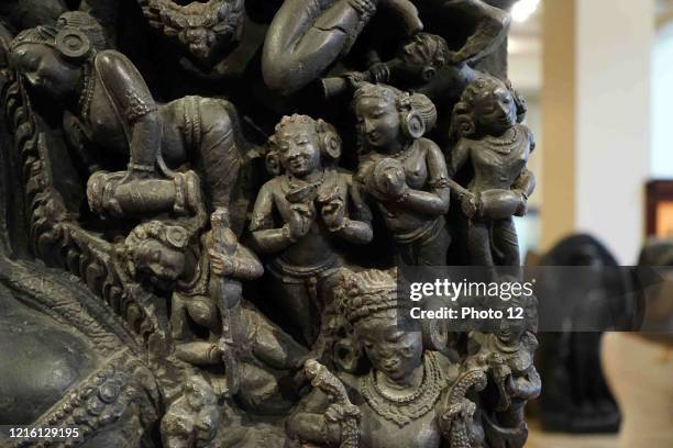 Detail of a bronze statue depicting the deity Shiva and the Goddess Parvati sitting as the primordial divine couple. Dated 12th Century.