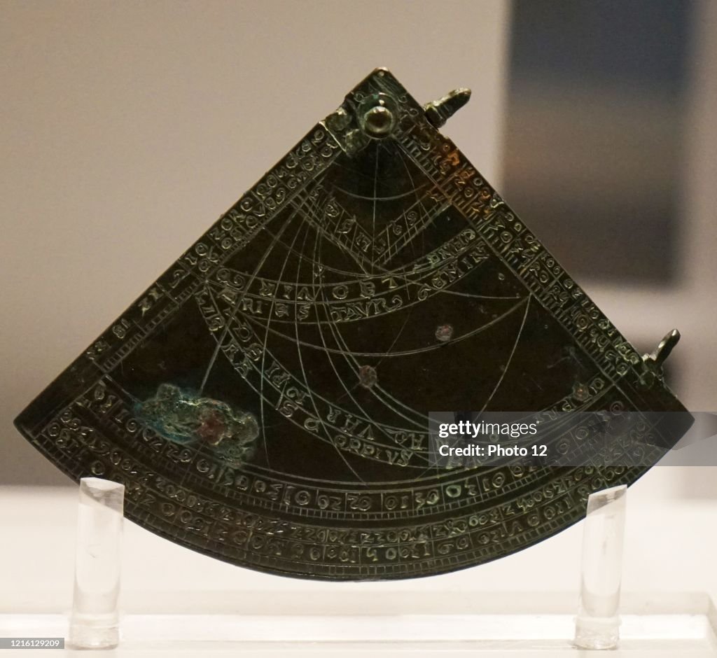 Copper-alloy astrolabe quadrant.