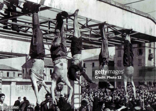 The death of Benito Mussolini, the Italian fascist dictator. Body of Mussolini next to Clara Petacci and other executed fascists, in Piazzale Loreto,...