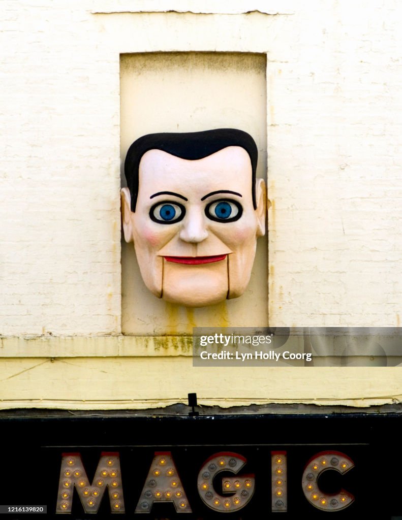 Magic puppet face on wall
