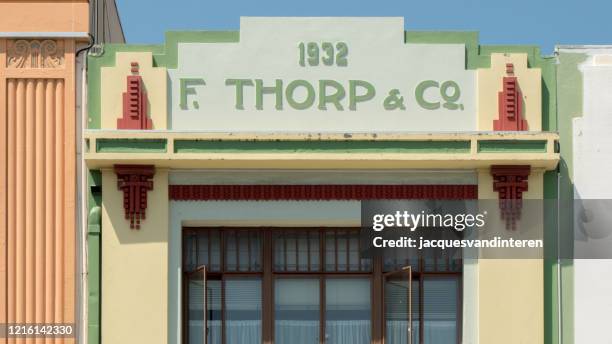 art deco architecture in napier, north island, new zealand - napier street stock pictures, royalty-free photos & images