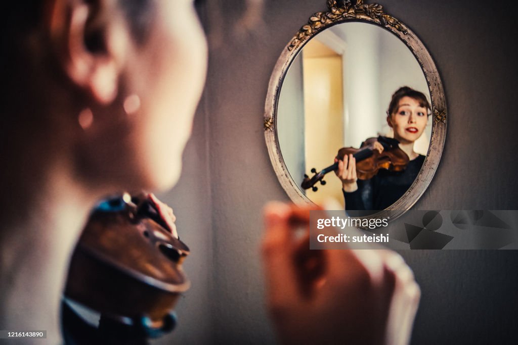 De violist in de spiegel