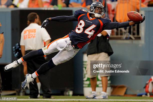 Wide receiver Brandon Lloyd of the Denver Broncos lays out but is unable to haul in a pass during the first half against the Buffalo Bills at Sports...