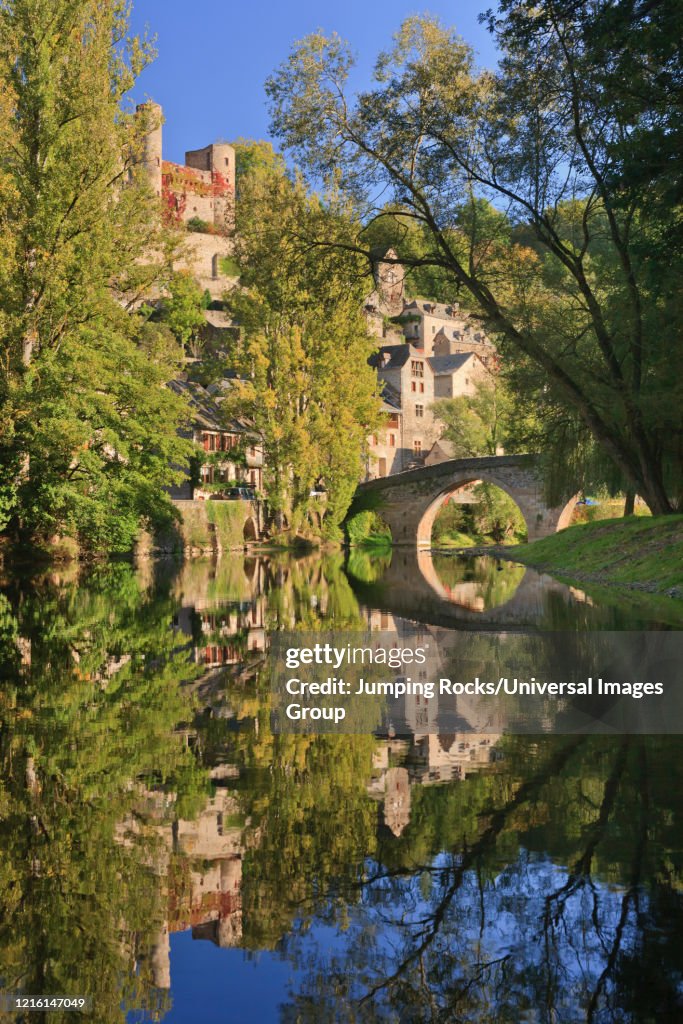15th Century Bridge and village with Chateau de Belcastel are situated on the Aveyron River, Belcastel, Aveyron, France