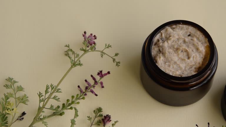 https://media.gettyimages.com/id/1216148915/video/hygiene-bath-product-body-face-scrub-with-wild-flowers-wellness-therapy-regeneration.jpg?b=1&s=640x640&k=20&c=FisvOGwkVr9fbRBP2N-G88oVSpgBC0Oi8ozpqSyYpTE=