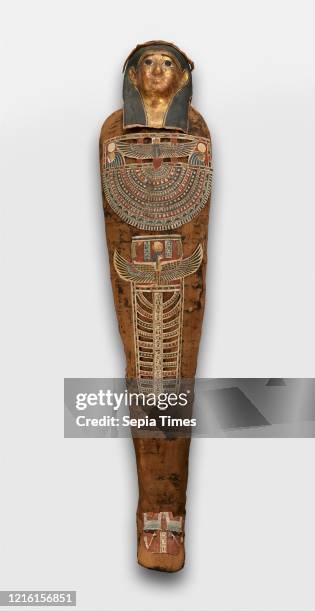 Mummy of Nesmin with plant wreath, mummy mask and other cartonnage elements, Ptolemaic Period, 200-30 B.C., From Egypt, Northern Upper Egypt, Akhmim...