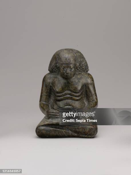 Statuette of a Scribe, New Kingdom, Dynasty 18, ca. 1391-1353 B.C., From Egypt, Upper Egypt, Thebes, Serpentinite, h. 12.5 cm , This statuette...