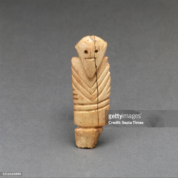 Figurine of a man, Predynastic, early Naqada II, ca. 3650-3450 B.C., From Egypt, Ivory , h. 6.5 x w. 2.2 x d. 0.9 cm , The earliest pieces of...