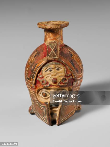 Terracotta aryballos in the form of a helmeted head, Archaic, ca. 600-575 B.C., East Greek, Terracotta, H. 7.01 cm., Vases, A helmeted warriorÕs head...