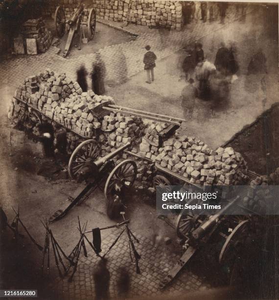 Barricades de la Commune, avril 71. Coin de la place Hotel de Ville & de la rue de Rivoli Albumen silver print, 10.6 x 10 cm , Photographs,...