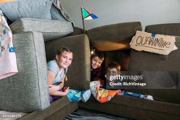 children in couch fort - corona virus isolated stock pictures, royalty-free photos & images